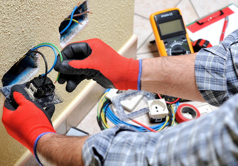 Electrician working with wires