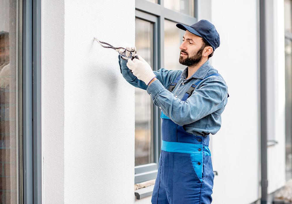 Electrician working on wiring